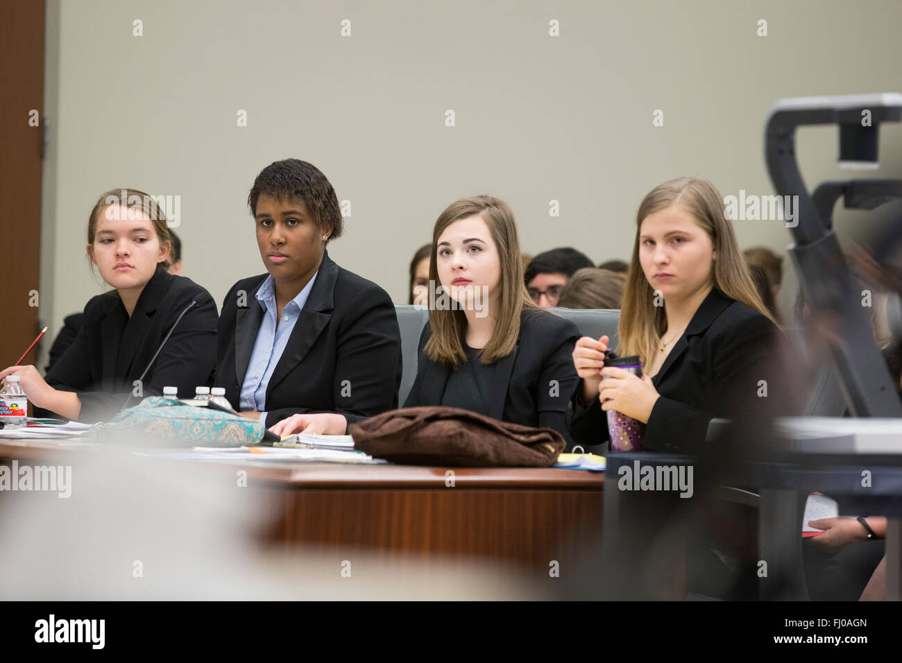 Teens posing as defense attorneys in mock trial for high school students participate in proceedings in county courtroom in Texas Stock Photo