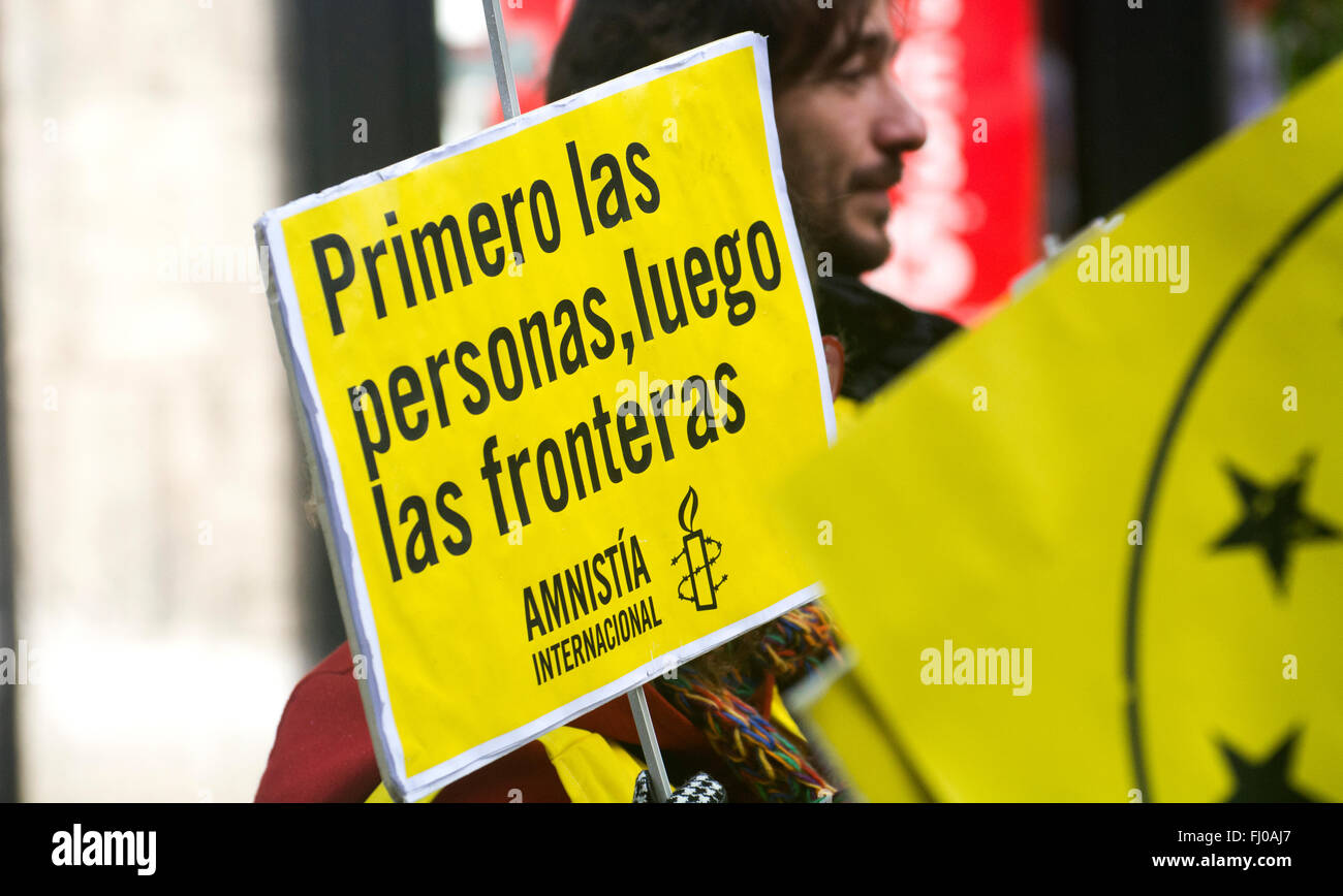 Oviedo Spain 27th February 2016 Plancard Of Amnesty International With The Text First The People Then The Borders During The European March In Favor Of The Rights Of Refugees In Oviedo Spain