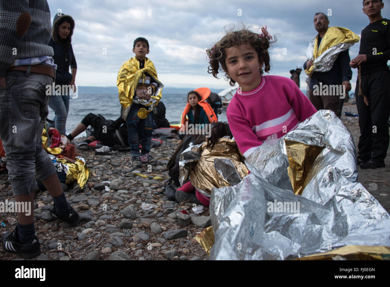 Refugees arriving on the shores of Efthalou, Lesbos in Greece. Stock Photo