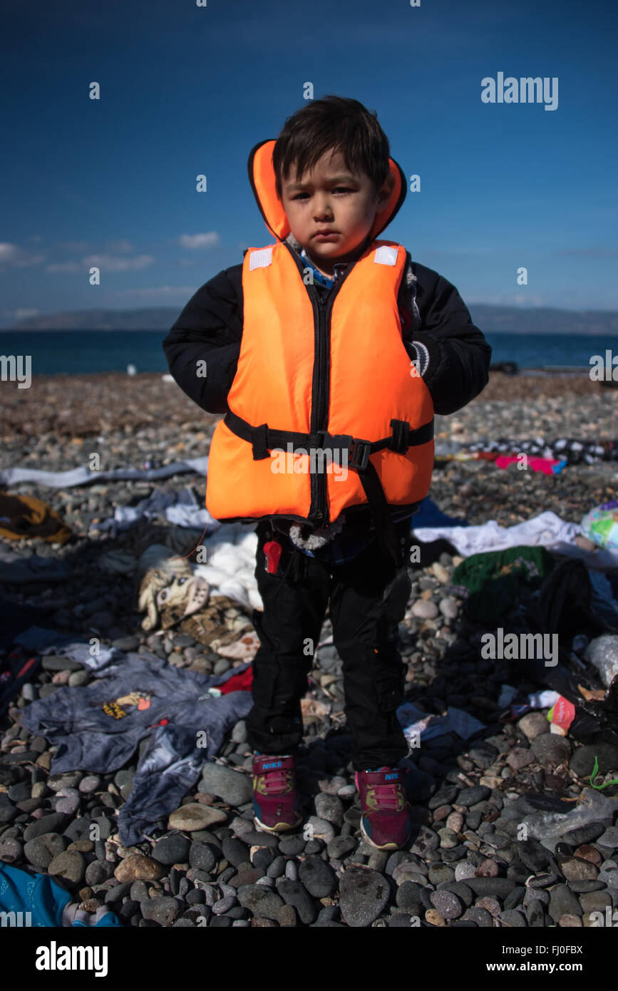 Refugees arriving on the shores of Efthalou, Lesbos in Greece. Stock Photo