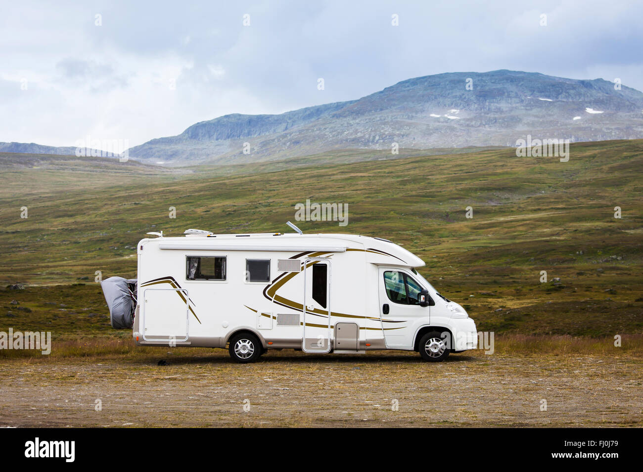Picture of a motor home, RV, in the wilderness of Swedish Lapland. Stock Photo