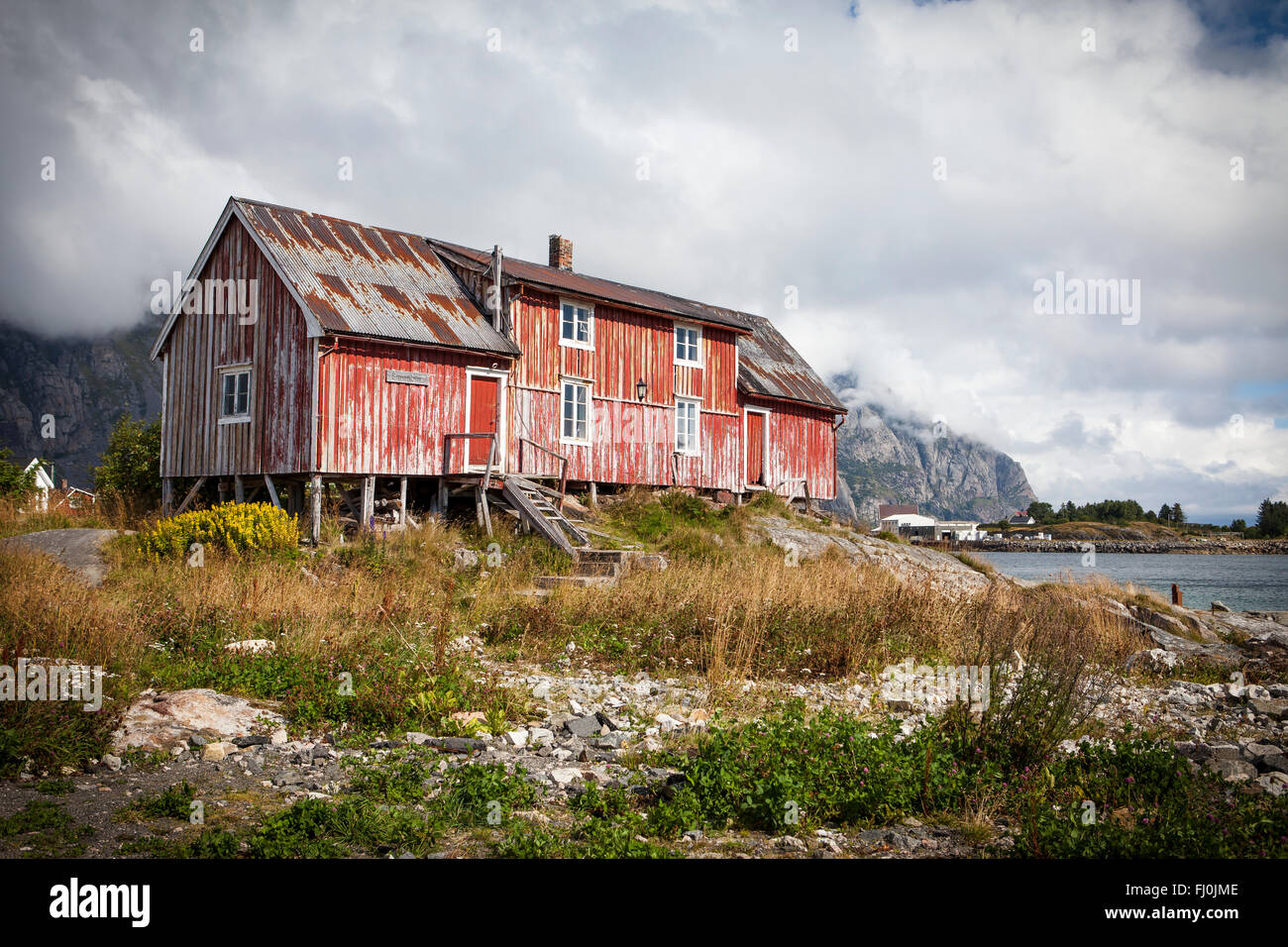 Picture of an old, red, fishing house in Henningsvaer at Lofoten islands Stock Photo