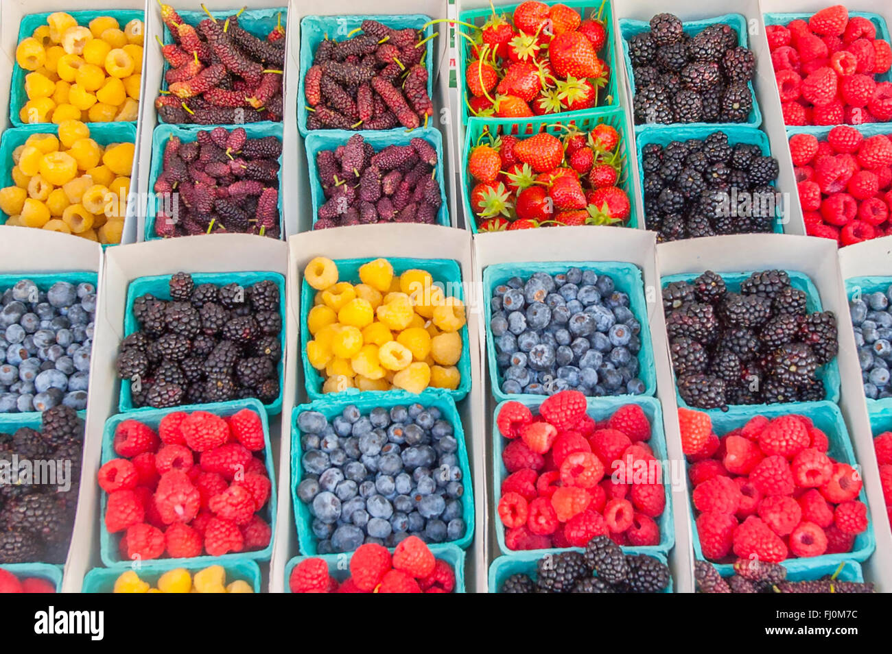 Farmers market - close up of berries in pint containers - local farm stand / farmer's market in Santa Monica California - vegan / vegetarian lifestyle Stock Photo
