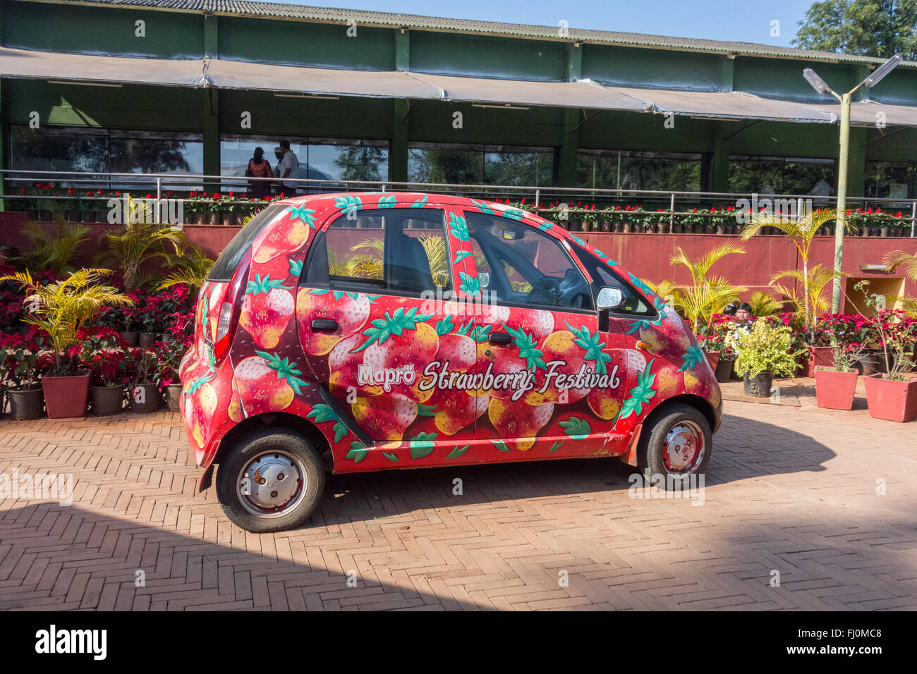 Tata Nano Strawberry Festival Car at Mapro Garden, Panchgani, Maharashtra, India Stock Photo