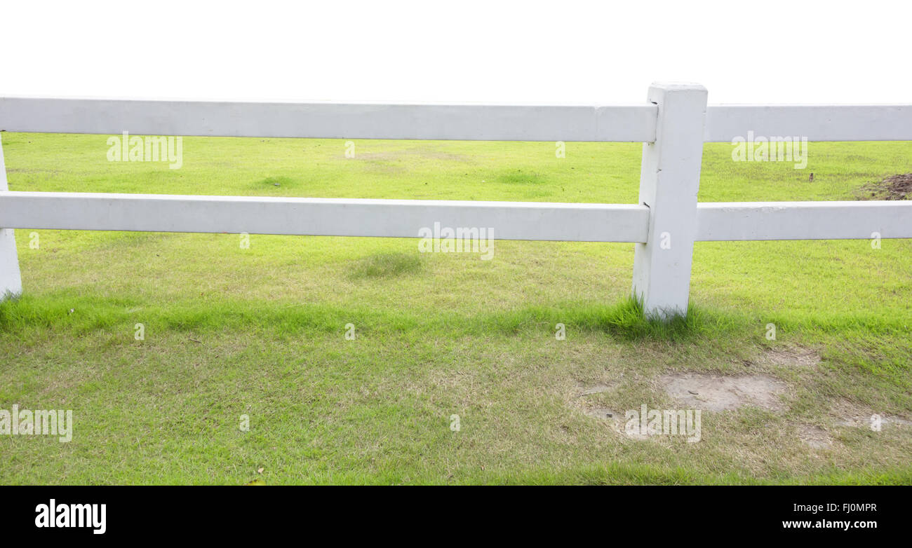 white fence and green grass isolated Stock Photo - Alamy