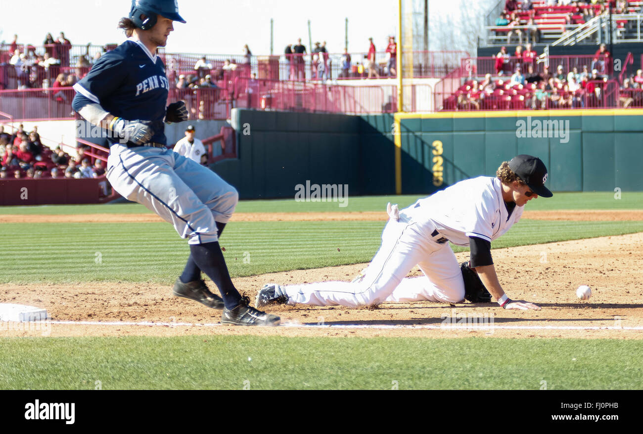 Columbia, SC, USA. 27th Feb, 2016. LT Tolbert (11) of the South Carolina Gamecocks cannot coral the throw from Marcus Mooney (8) of the South Carolina Gamecocks and gives up a run in the NCAA Baseball match-up between the Penn State Nittany Lions and the South Carolina Gamecocks at Founders Park in Columbia, SC. Scott Kinser/CSM/Alamy Live News Stock Photo