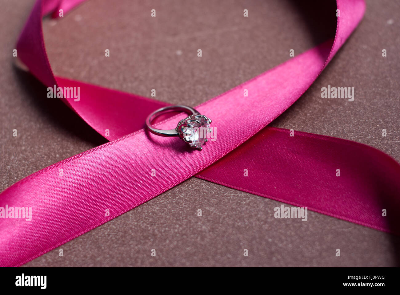 Beautiful ribbon with ring Stock Photo - Alamy