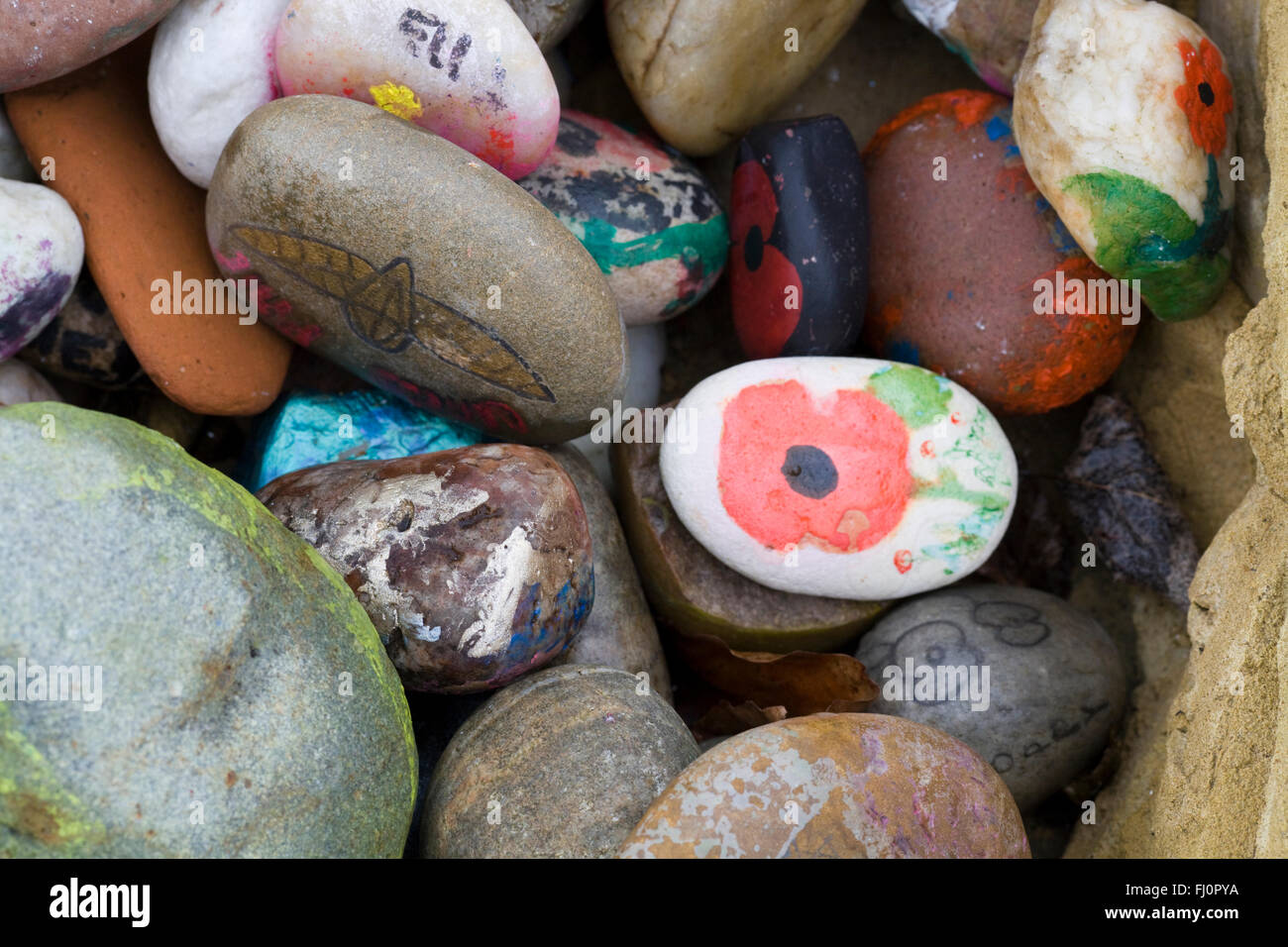 Hand Painted Remembrance Stones in a Graveyard Stock Photo