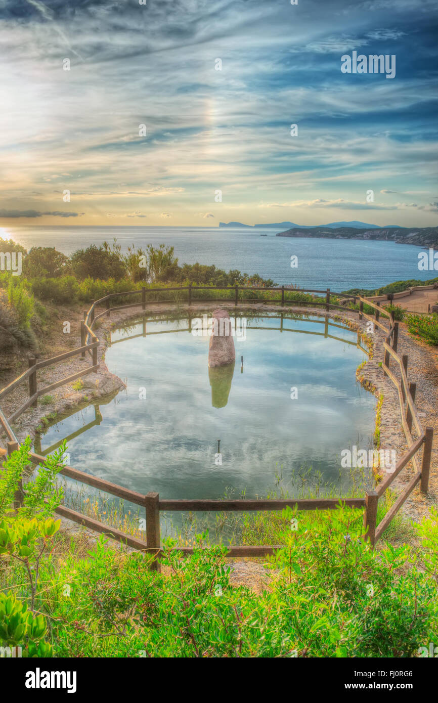 colorful pond by the sea in Sardinia, Italy Stock Photo