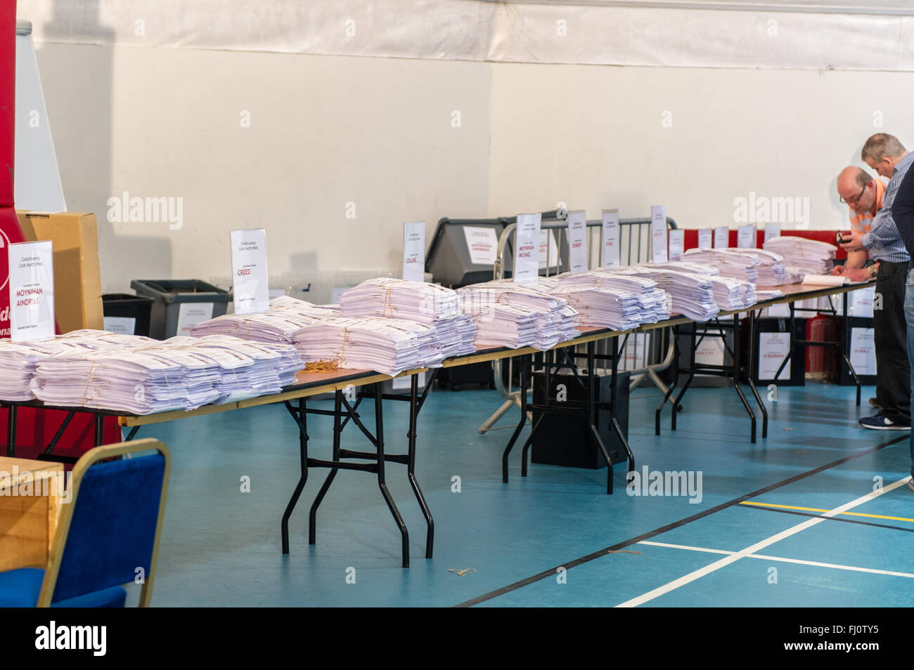 Ballincollig, Ireland. 27th February, 2016. Thousands of voting slips sit on tables waiting for the second count in the Cork North West constituency in the 2016 Irish General Election. The count was held at Coláiste Choilm in Ballincollig, Co. Cork, Ireland. Credit: AG News/Alamy Live News Stock Photo