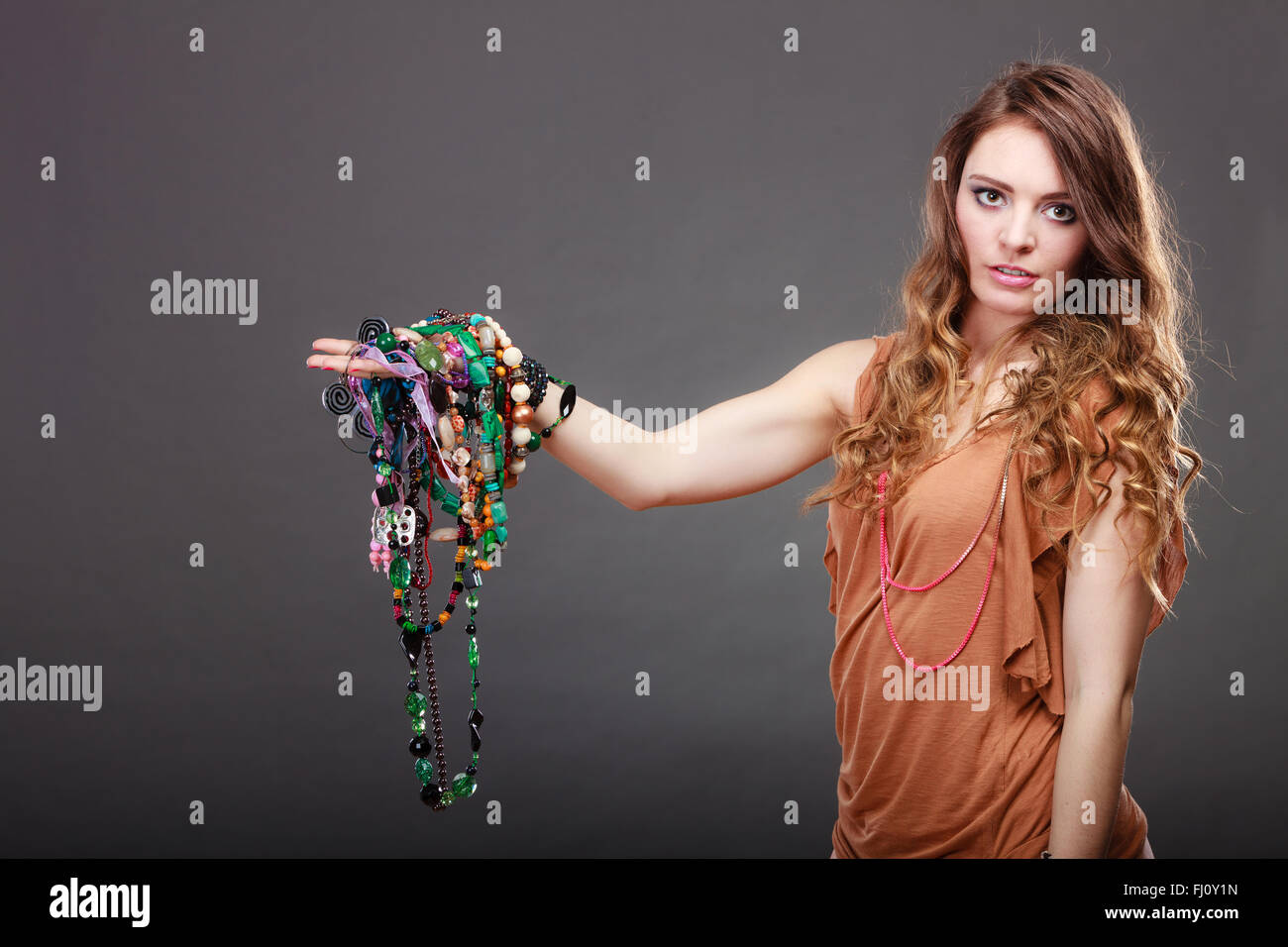 Woman wearing diamond necklace hi-res stock photography and images - Alamy