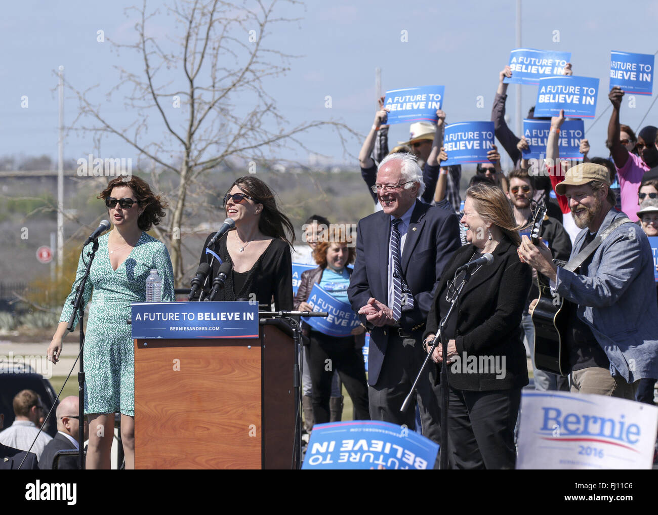 Austin, Texas, USA. 27th Feb, 2016. Democratic Presidential candidate BERNIE SANDERS and wife JANE O'MEARA SANDERS are joined on stage by musicians CATHY GUTHRIE and AMY NELSON (left, daughters of Woody Guthrie and Willie Nelson) along with Austin musician GUY FORSYTH (R) for a rendition Woody Guthrie's ''˜This Land is Your Land' at the conclusion of SANDERS' campaign rally at the Circuit of the Americas just outside Austin, Texas. Credit:  Scott W. Coleman/ZUMA Wire/Alamy Live News Stock Photo