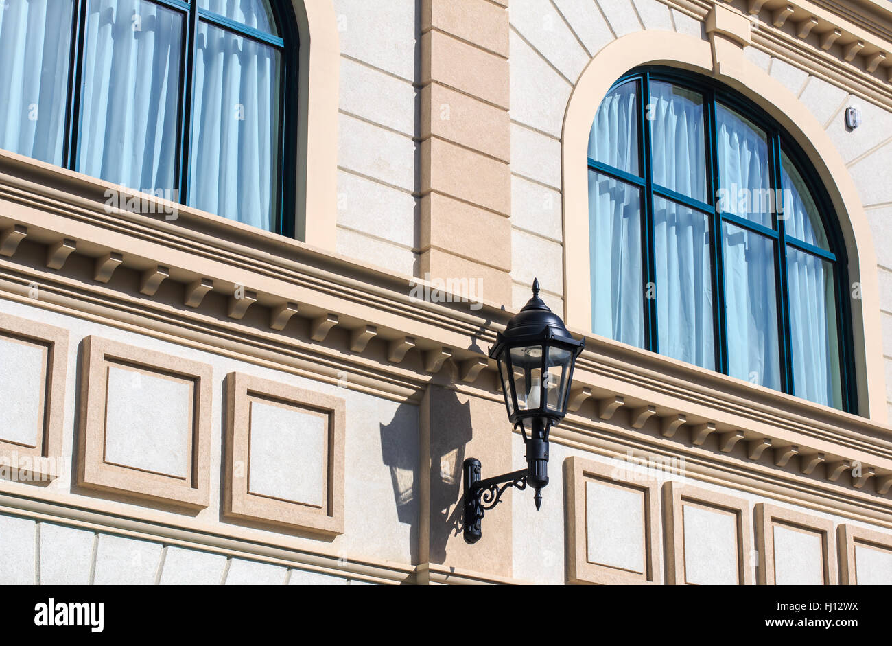 Lantern on the wall of the building. Stock Photo