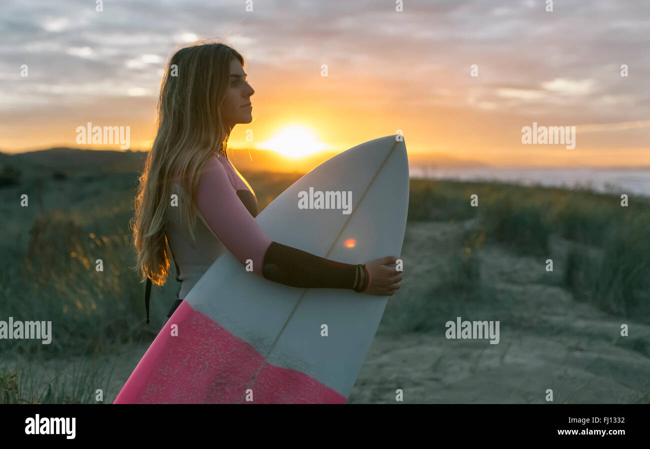 Female surfer evening light hi-res stock photography and images - Alamy