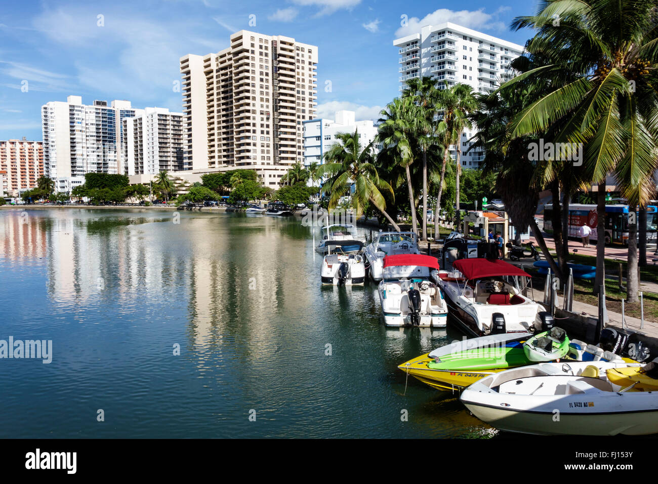 Miami Beach Florida,Lake Pancoast,Indian Creek,high rise condominium buildings,boats,Collins Avenue,FL160117030 Stock Photo