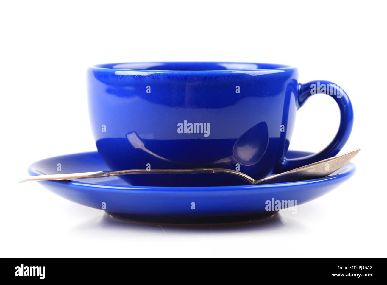 blue cup and spoon on white background isolated Stock Photo Alamy