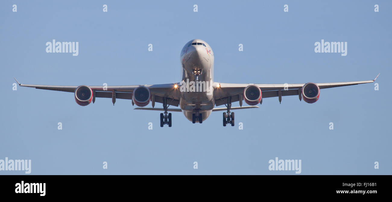 Virgin Atlantic Airbus a340 G-VBUG on final approach to London-Heathrow Airport LHR Stock Photo