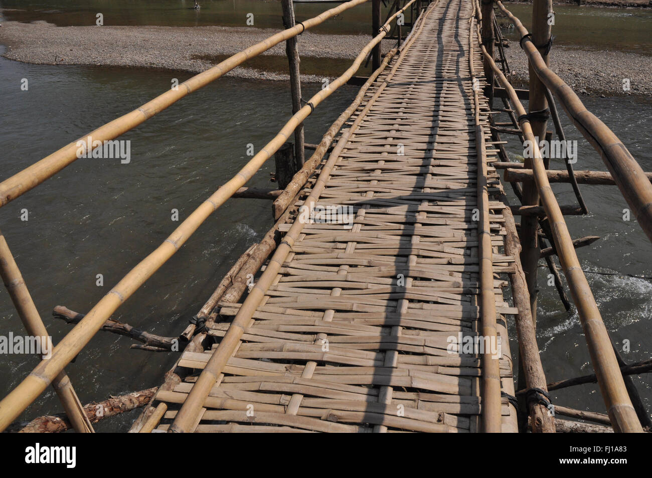 Detail of a bamboo bridge across the Nam Kham River, Luang Prabang ...