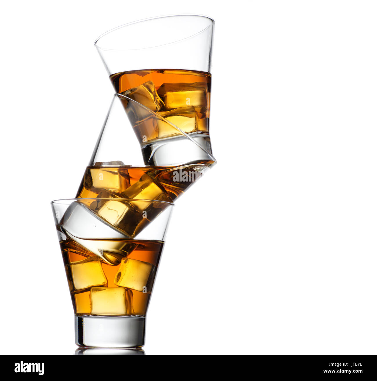 Three glasses of whiskey on the rocks Stock Photo Alamy