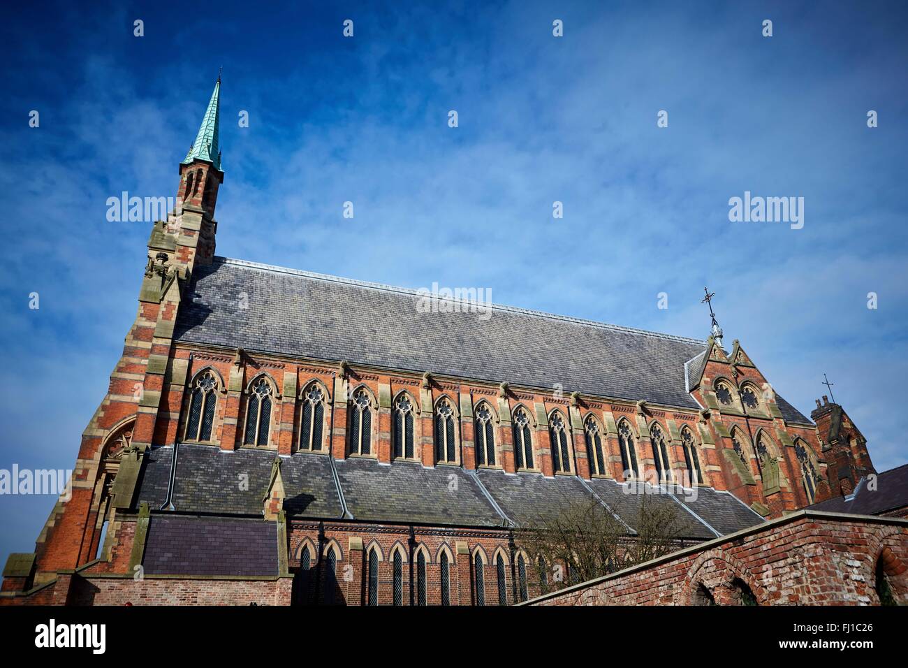 The Church and Friary of St Francis, known locally as Gorton Monastery blue sky sunny copyspace Church religion religious archit Stock Photo