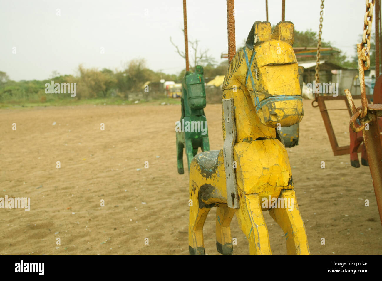 Wooden horse ride Stock Photo - Alamy