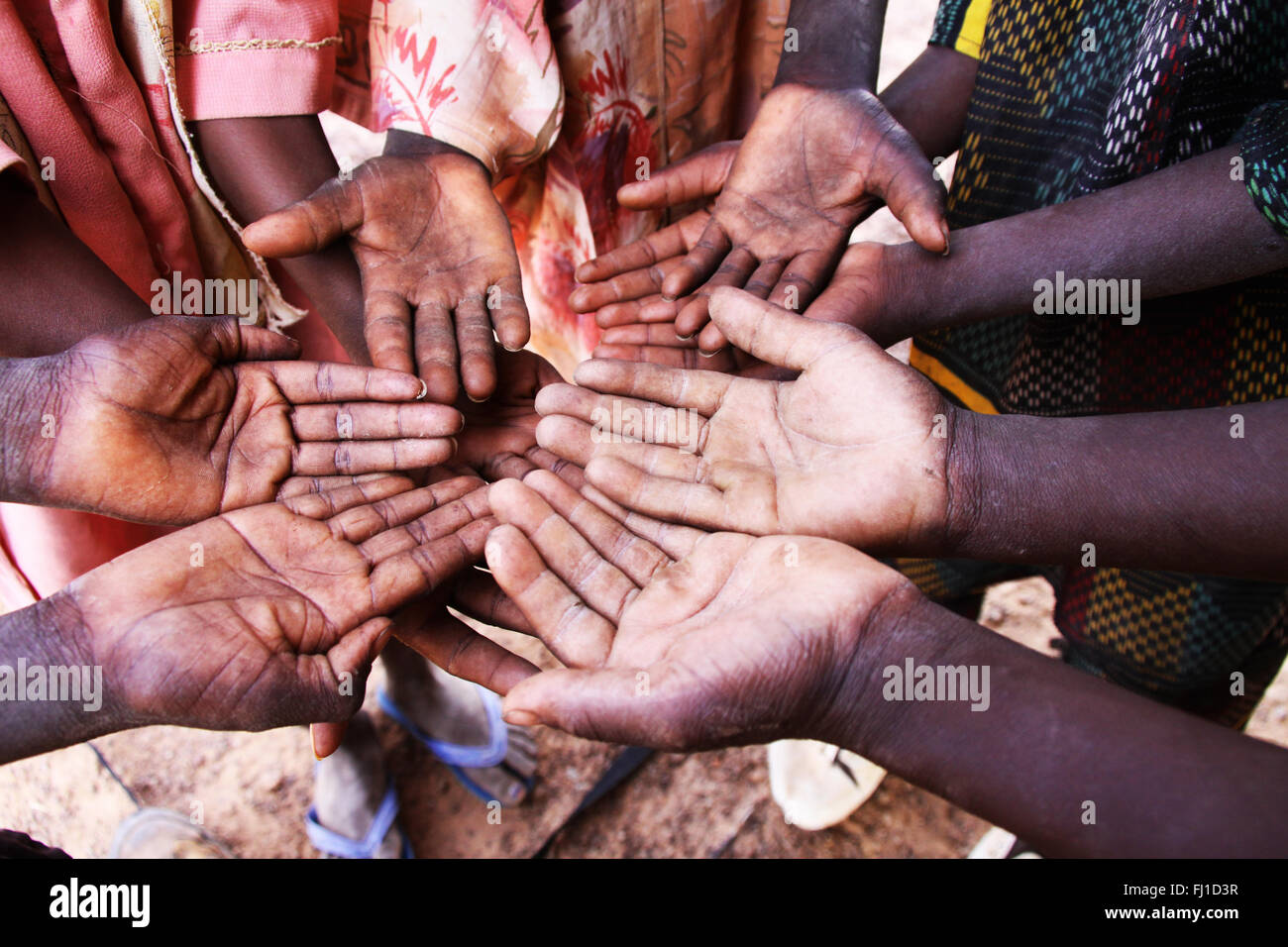 Hands of African children united in Cotonou in Benin Stock Photo