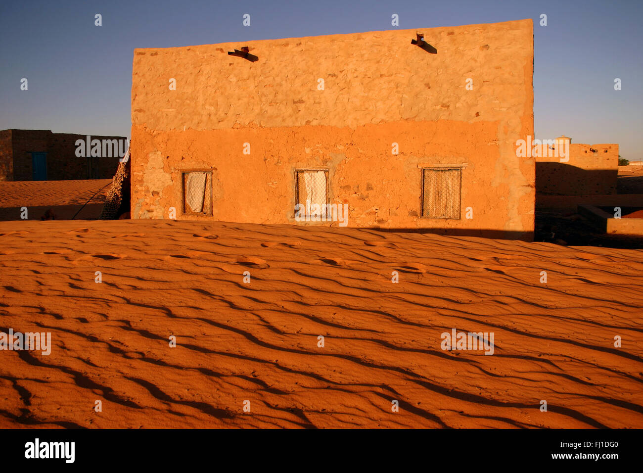 Chinguetti : architecture , house almost buried in the Sahara sands in the desert city Stock Photo