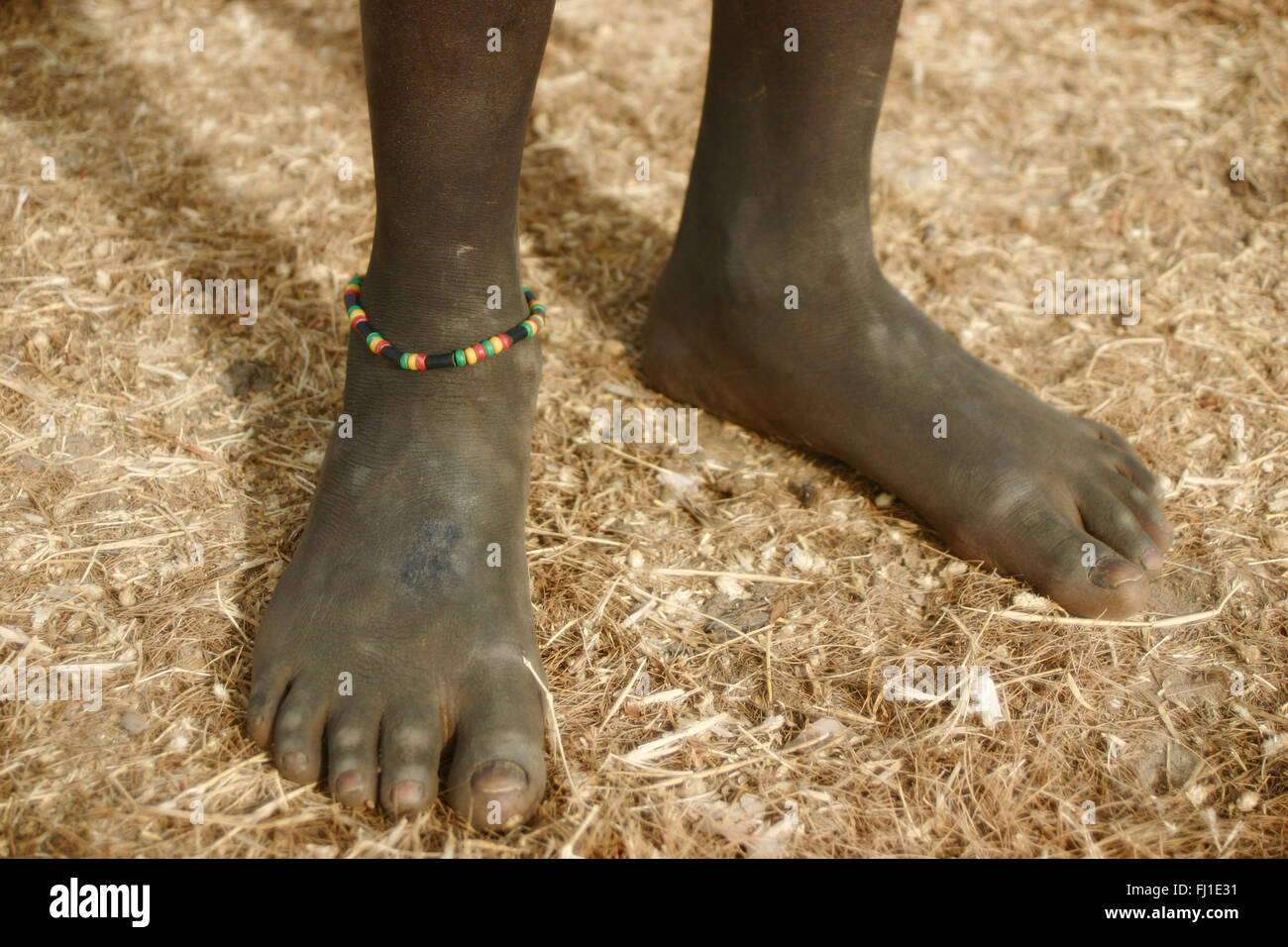 Feet of African child in Senegal Stock Photo