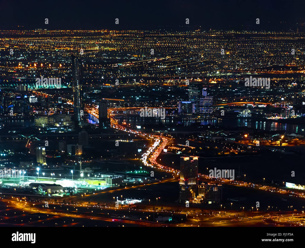 Colorful lights of Dubai at night, aerial view Stock Photo Alamy