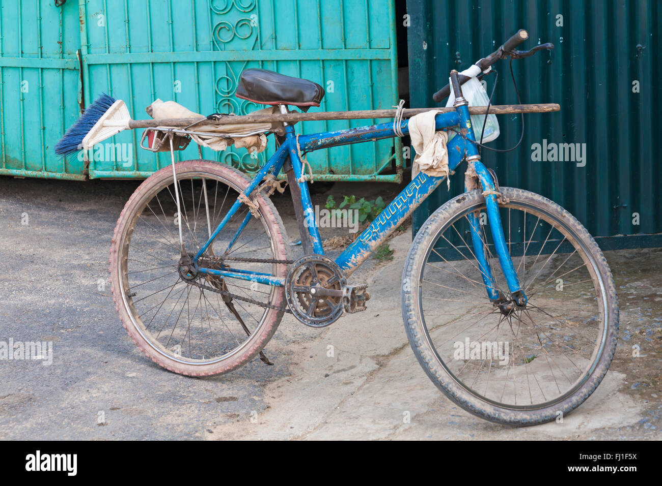 Old bicycle with broom brush attached on stand at Vinales, Pinar del Rio  Province, Cuba, West Indies, Caribbean Stock Photo - Alamy
