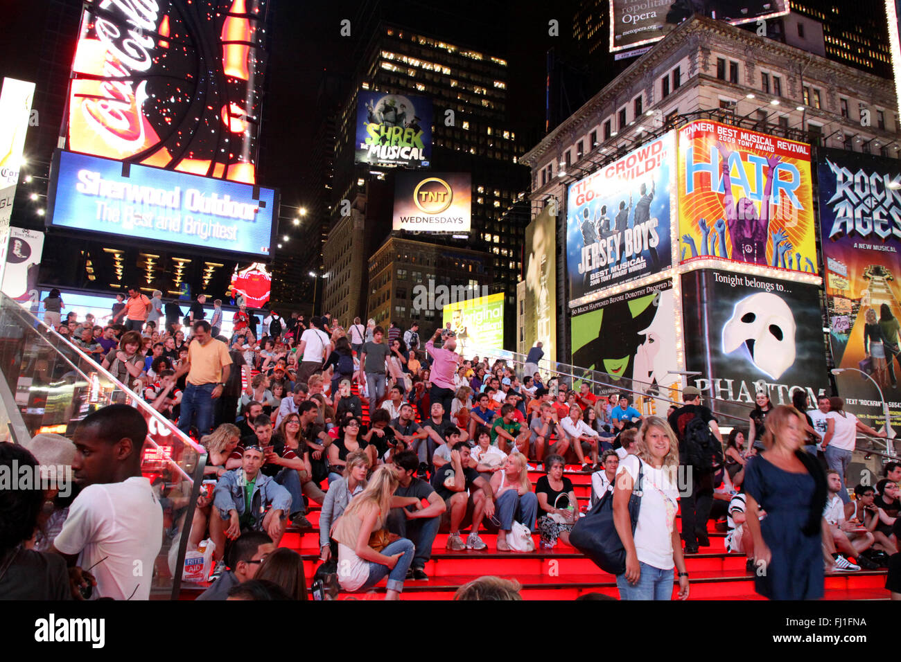 People on Times square at night, Manhattan , New York Stock Photo