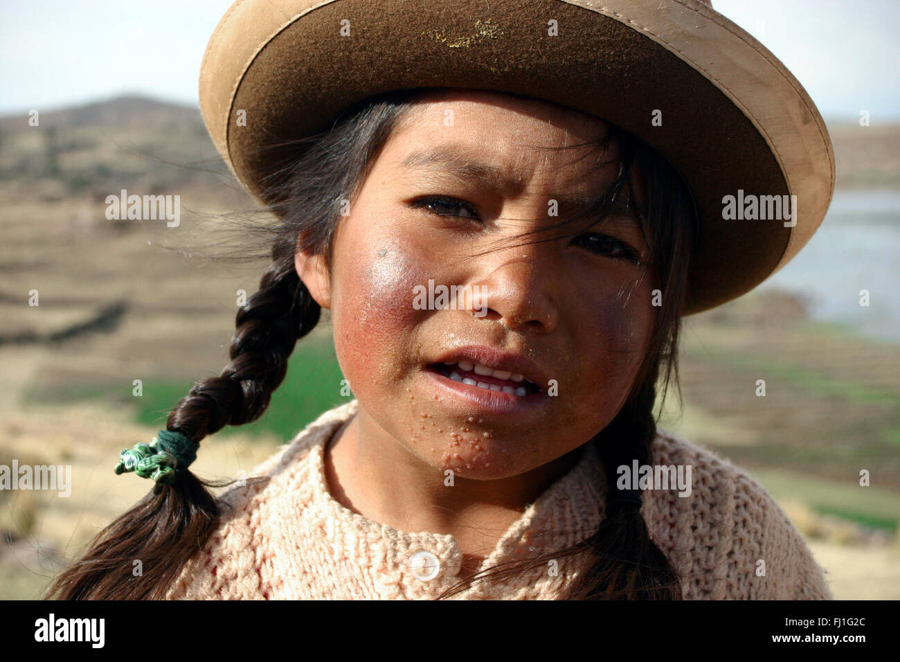 Portrait of Peruvian girl in Sillustani , Peru Stock Photo