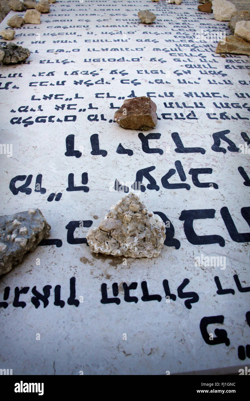 Stones on a Jewish tomb in Jerusalem cemetery (according to tradition) Stock Photo
