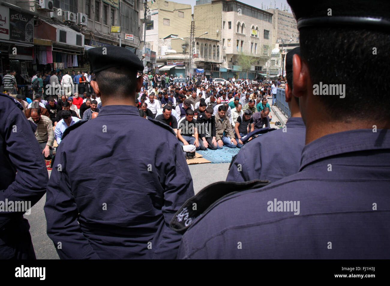 Protestations in the streets of Amman, Jordan,  with tight security during Friday prayer, March 2011 - context of Arabic spring Stock Photo