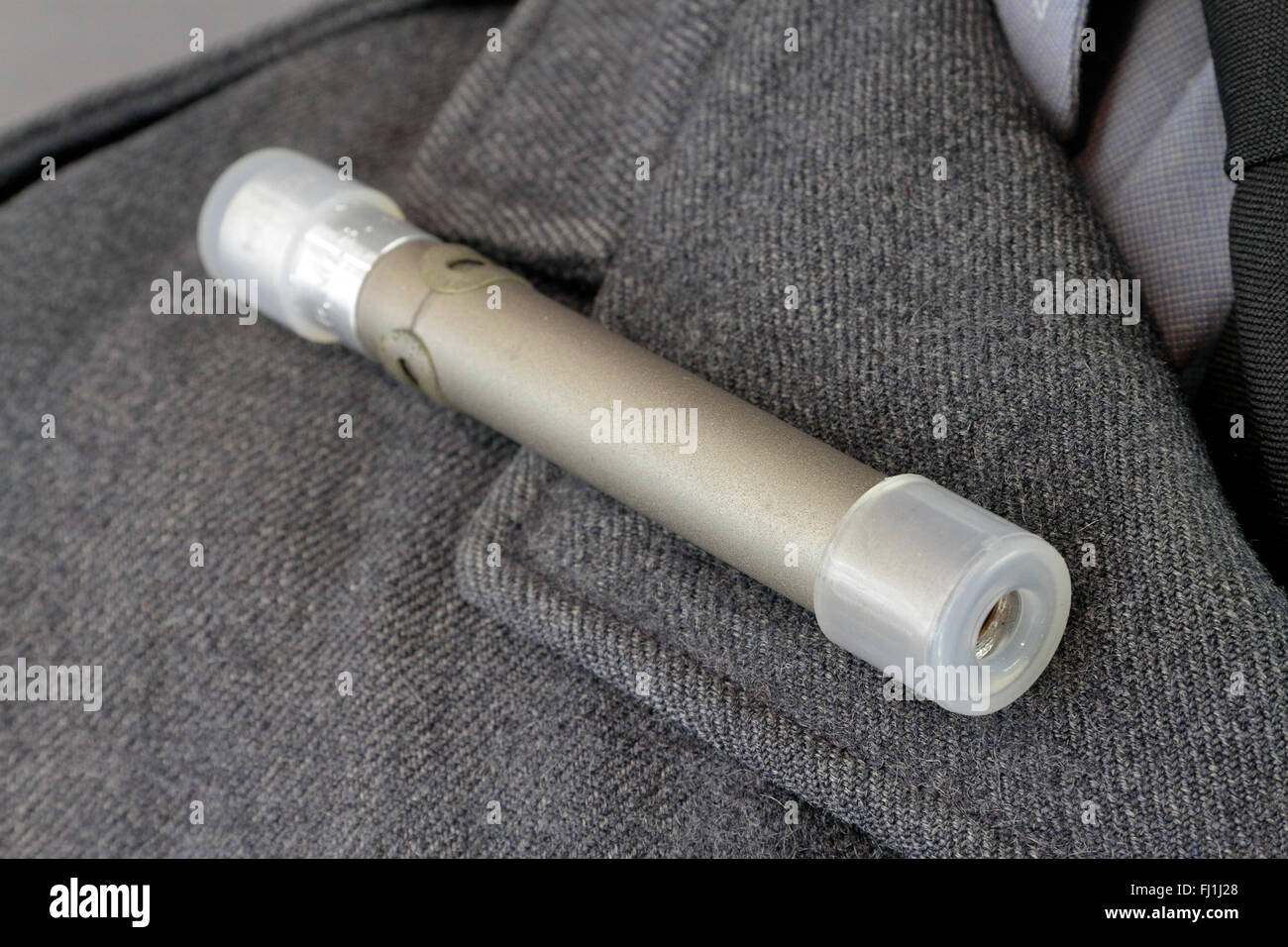 A quartz fiber dosimeter (to measure radiation exposure over time) in