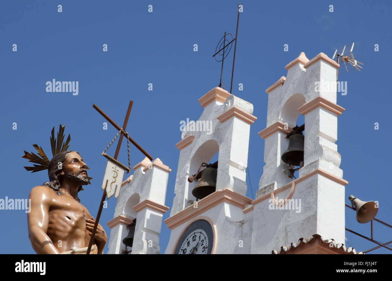 Holy Week float with Jesus Resurrection Christ close to the church, Spain Stock Photo