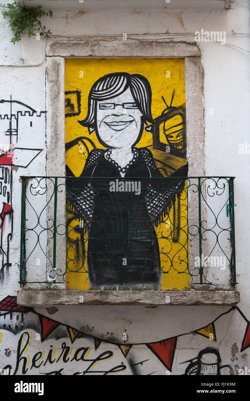 Portugal, city of Lisbon, woman by window mural, graffiti, street art at Escadinhas de Sao Cristovao Stock Photo