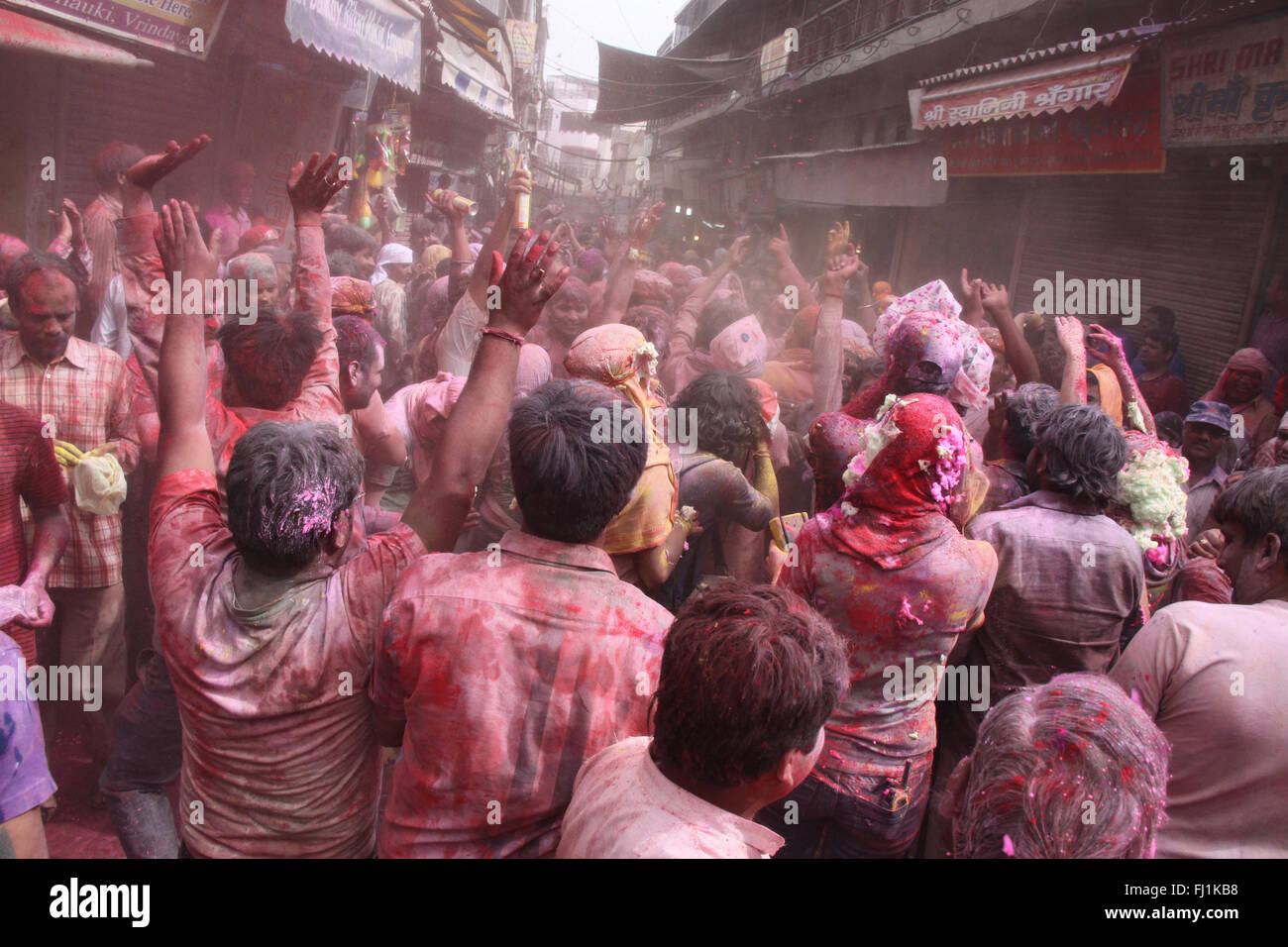 Crowd in Vrindavan during Holi celebrations , India Stock Photo
