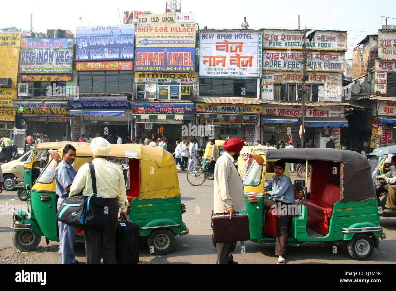 traffic and people in Pahar Ganj, New Delhi, India Stock Photo