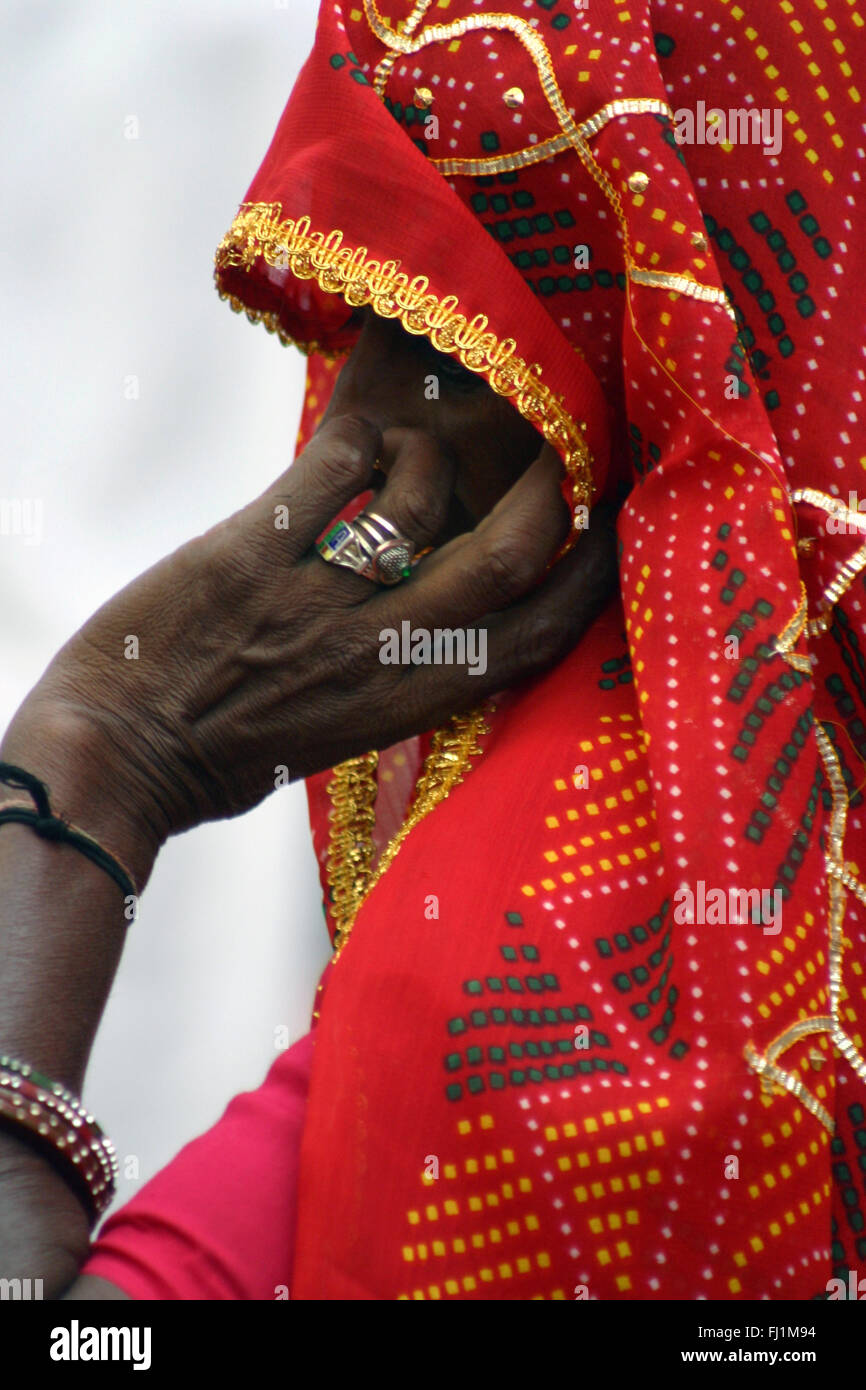 Woman wearing traditional red saree in Pushkar, Rajasthan , India Stock ...