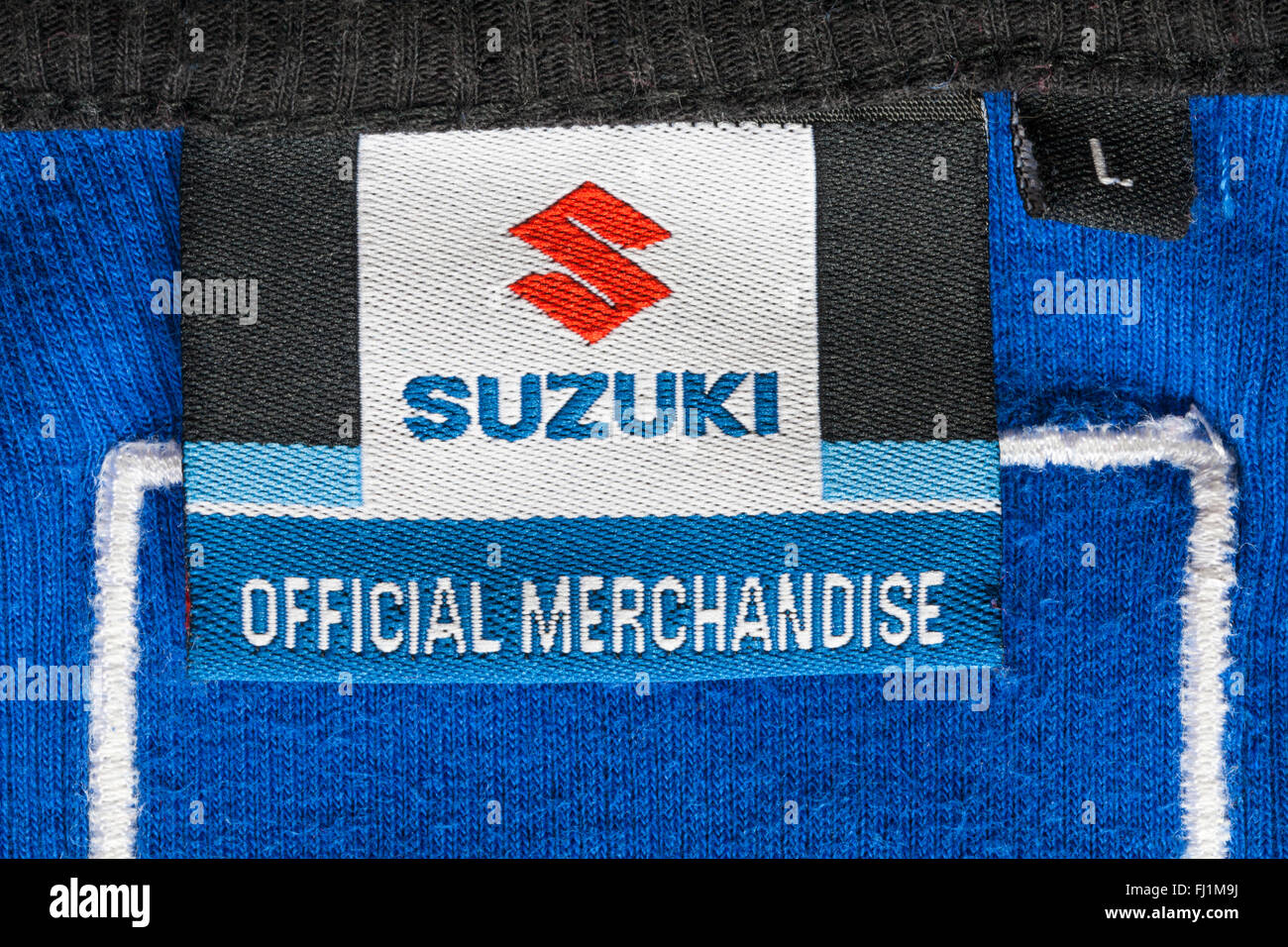 label in Suzuki Official Merchandise blue top Stock Photo