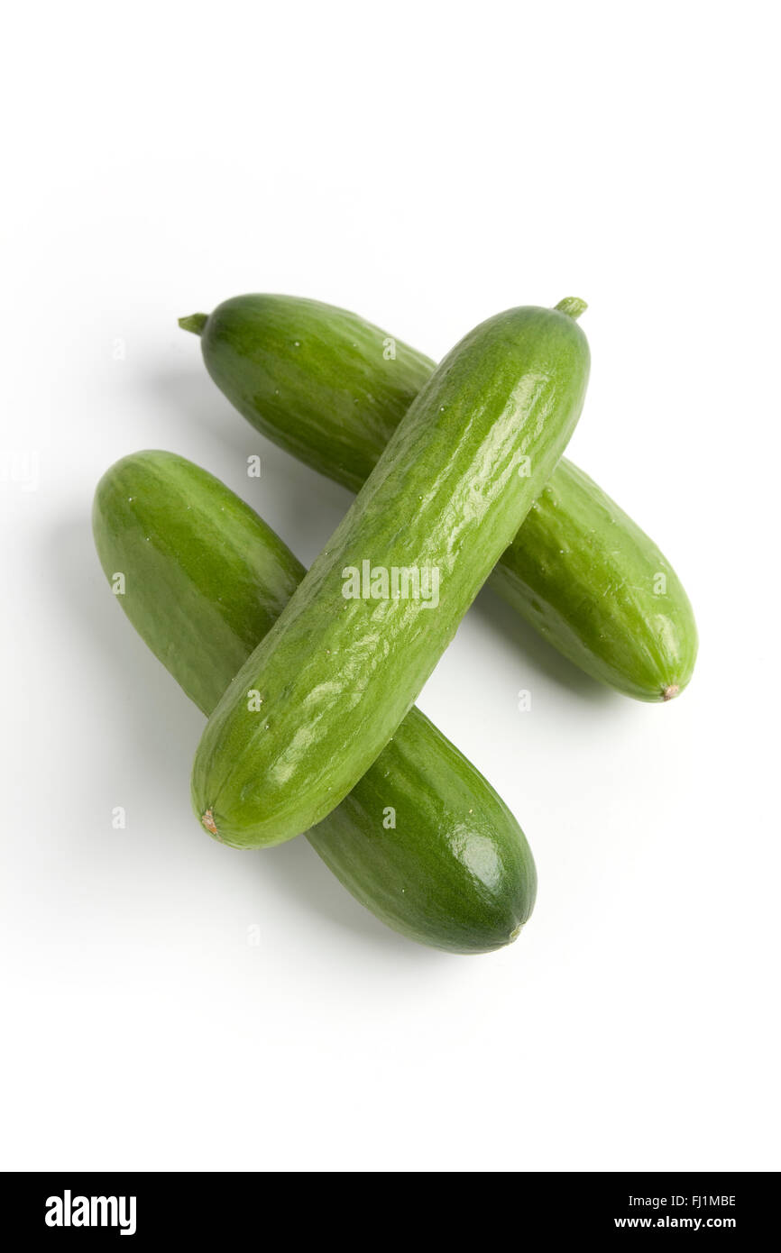 Fresh Raw Mini Cucumber Isolated On White Stock Photo - Download