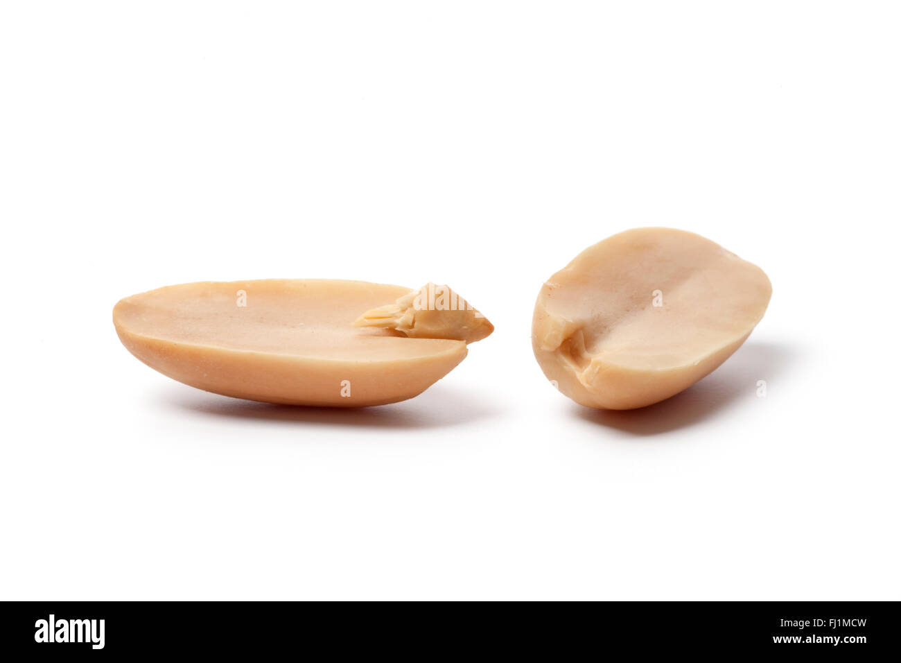 Peeled peanuts on white background Stock Photo