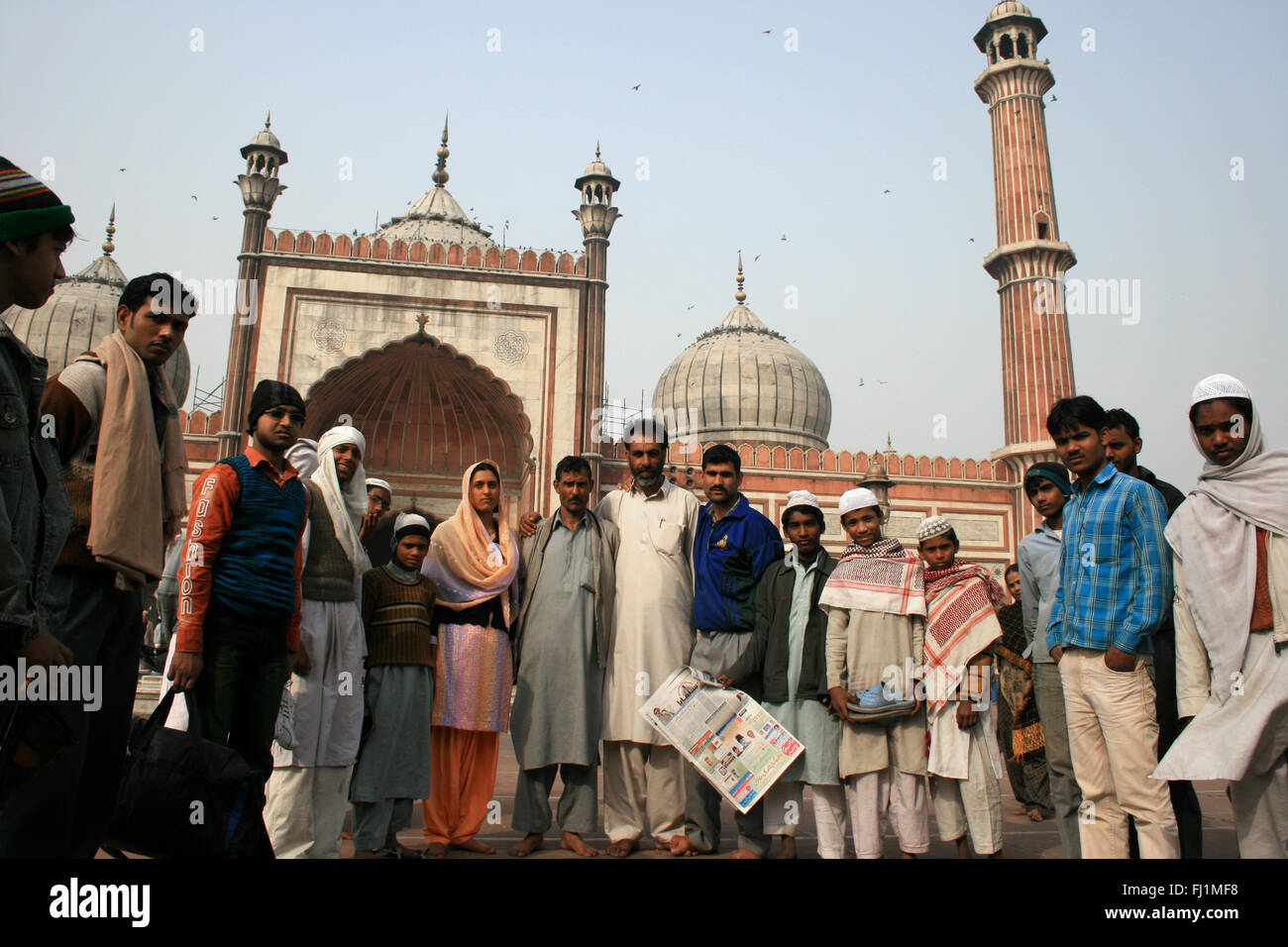 Muslims visiting the Jama Masjid (great mosque) of Old Delhi , India Stock Photo