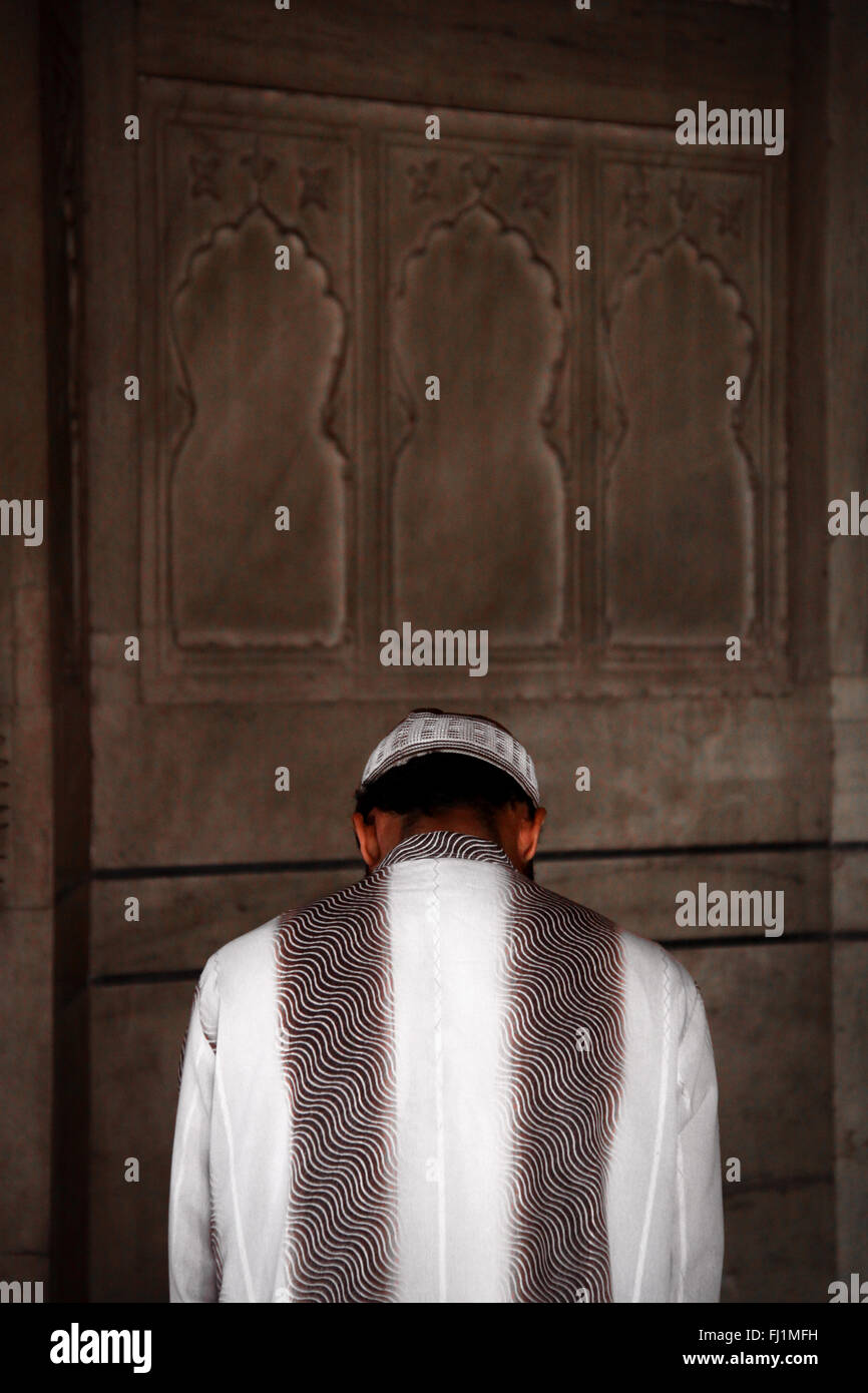 Muslims praying at jama Masjid (great mosque) of Old Delhi , India Stock Photo