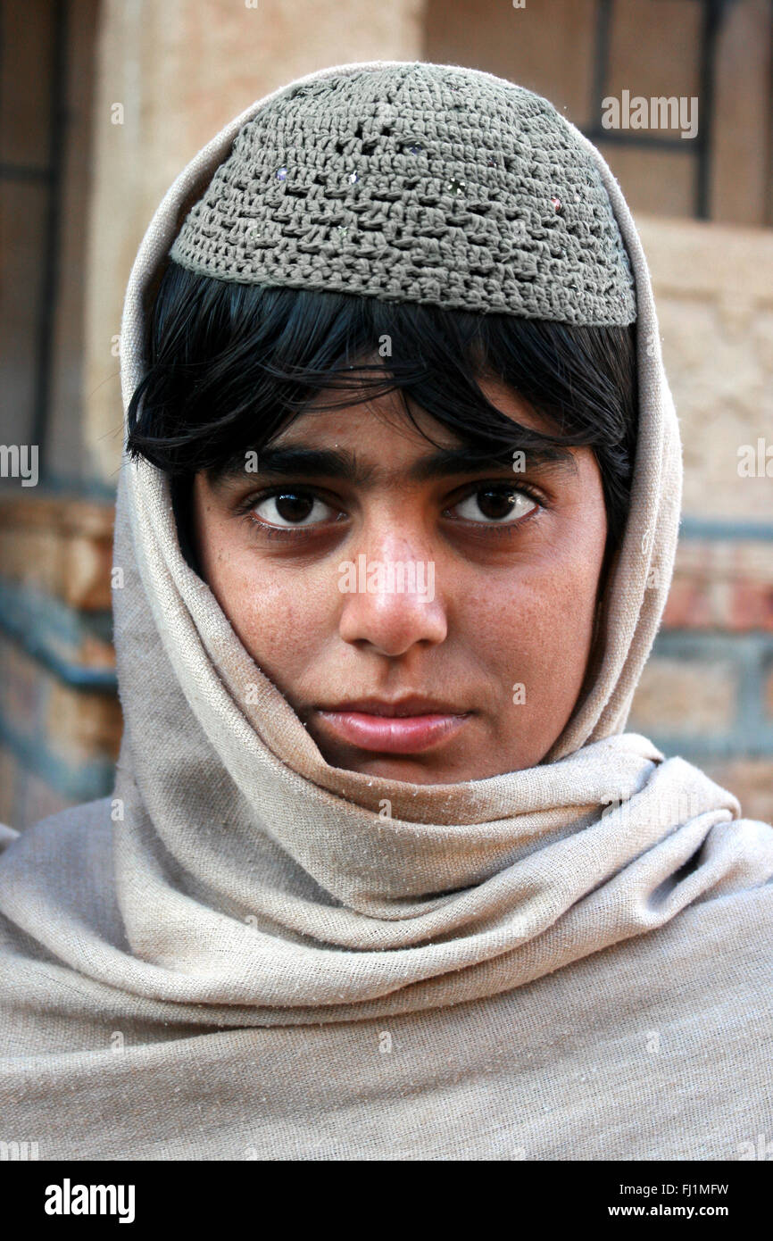 Young Muslim man with Taqiyah (cap) in Jaisalmer , India Stock Photo