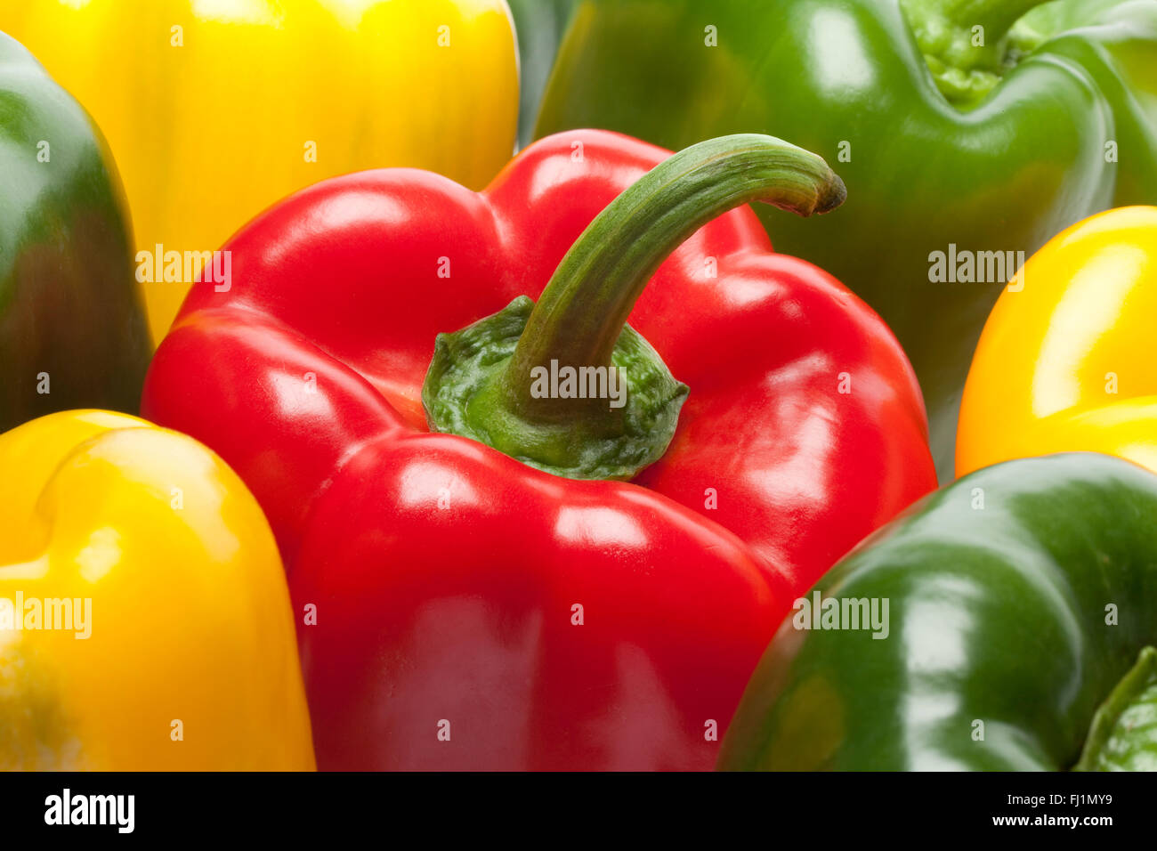 Fresh red,green,yellow bell peppers full frame Stock Photo