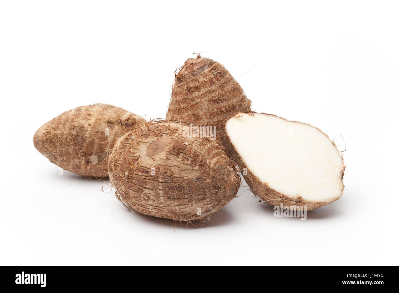 Fresh raw Taro roots on white background Stock Photo Alamy
