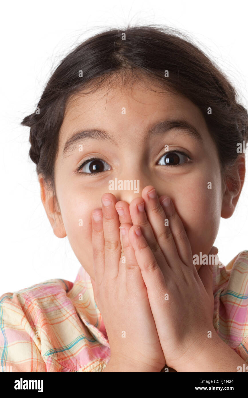 Portrait of a very surprised little girl on white background Stock ...