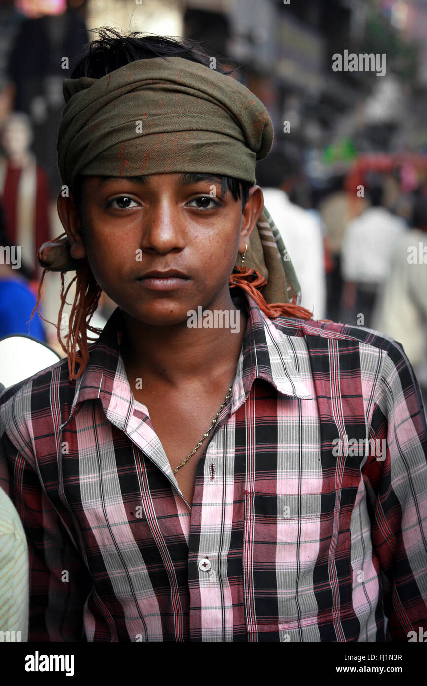 Young man with turban and check shirt in Delhi, India Stock Photo